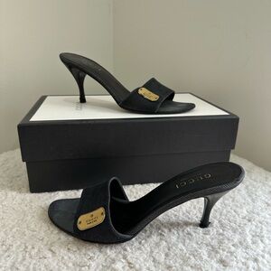 Gucci Black Heeled Mules with Gold Accent. Size 8
